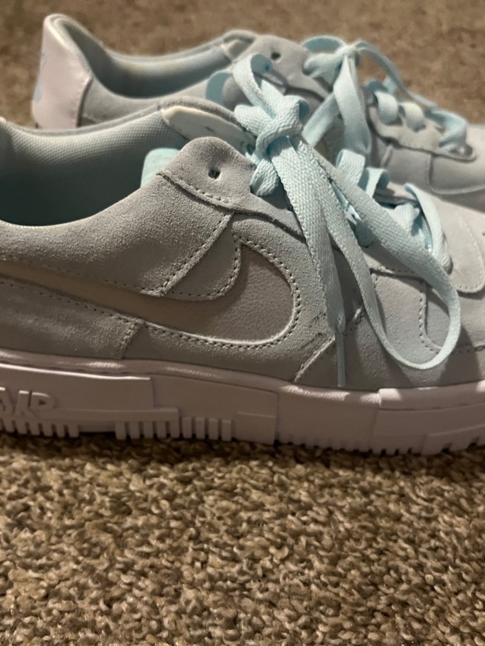 Nike woman’s  Light Blue Suede Platform Sneakers